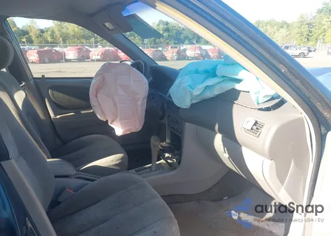 1999 Toyota Corolla Ve/Ce/Le z USA, uszkodzony, nr VIN 2T1BR12EXXC240928